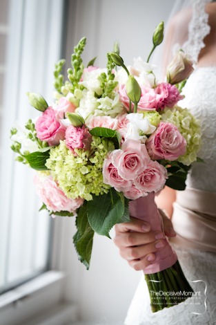 Jennifer carried a romantic style bouquet designed with blush cream 
